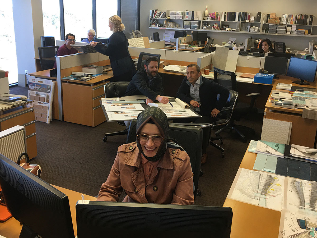Office Setting - Emine at Desk - Employees Working